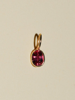 Tanning Gelee Orange Sapphire Oval Cut Charm in Yellow 14k Gold