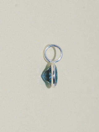 Ticket to London Blue Topaz Round Cut Charm in Sterling Silver
