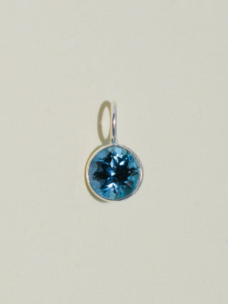 Ticket to London Blue Topaz Round Cut Charm in Sterling Silver