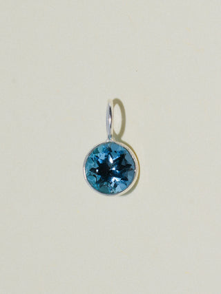 Ticket to London Blue Topaz Round Cut Charm in Sterling Silver